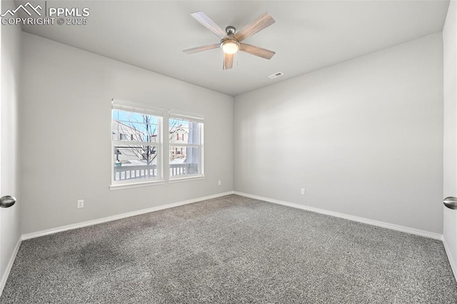 carpeted empty room with ceiling fan