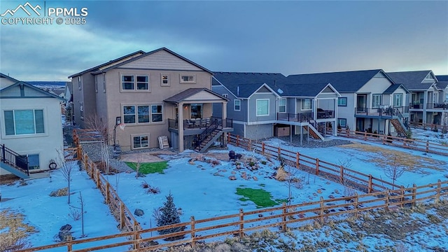 view of front facade featuring a wooden deck