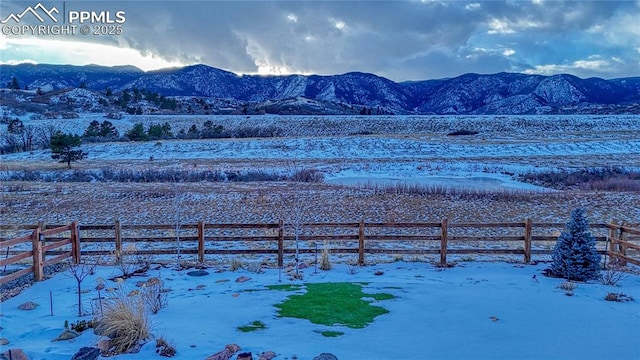 view of mountain feature featuring a rural view