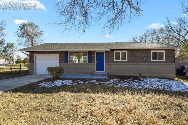 ranch-style house featuring a garage