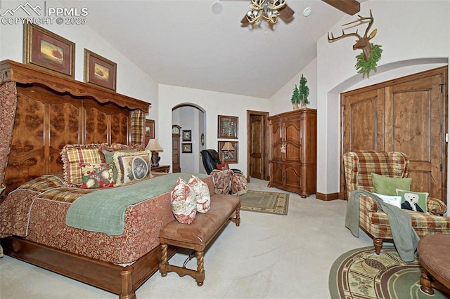 bedroom featuring vaulted ceiling with beams and light colored carpet