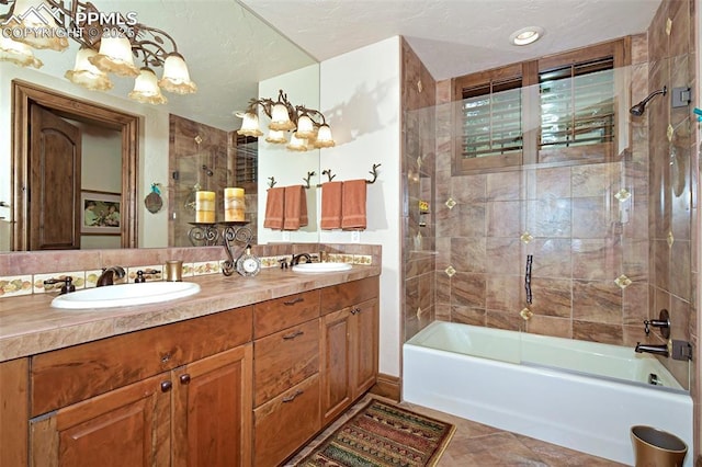 bathroom with tile patterned floors, vanity, and shower / bath combination with glass door