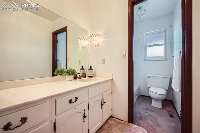 bathroom with vanity and toilet