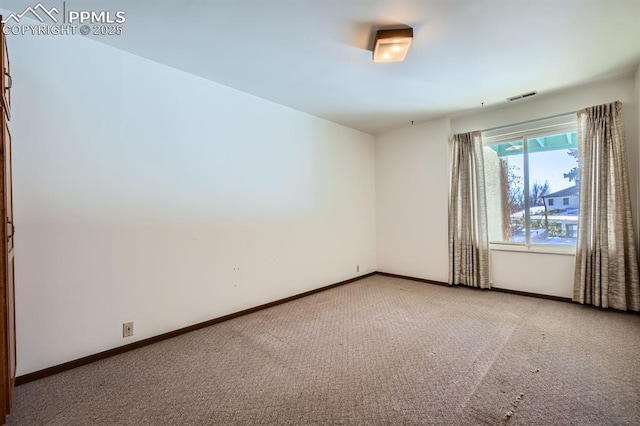 empty room with carpet floors