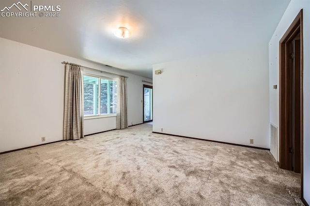 view of carpeted spare room