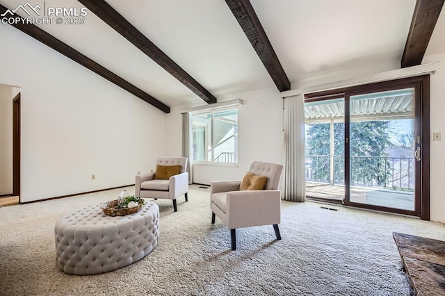 living area featuring carpet floors and lofted ceiling with beams