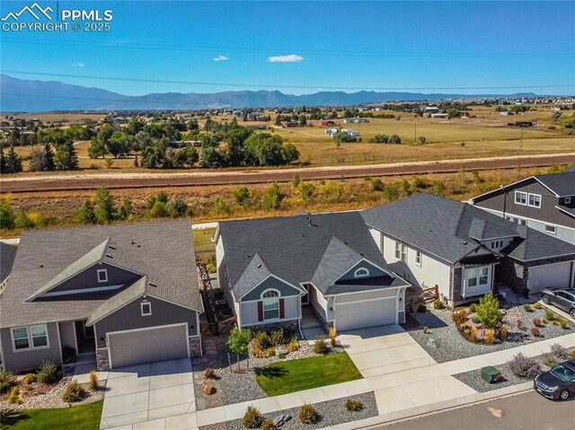 bird's eye view with a mountain view