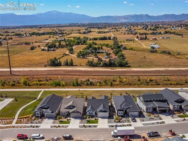 bird's eye view with a mountain view