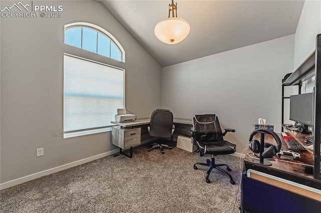 office area with carpet, vaulted ceiling, and a healthy amount of sunlight