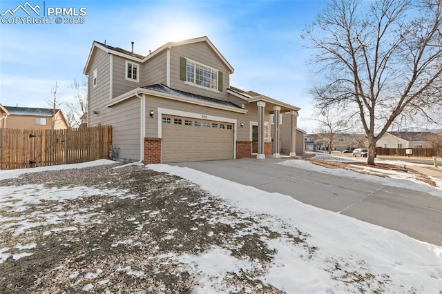 view of front of property featuring a garage