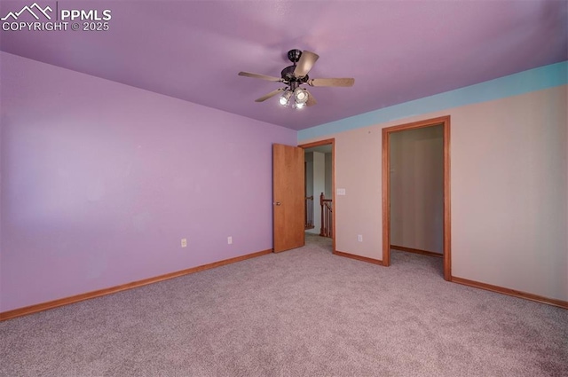 unfurnished bedroom with light colored carpet and ceiling fan