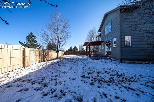 view of snowy yard