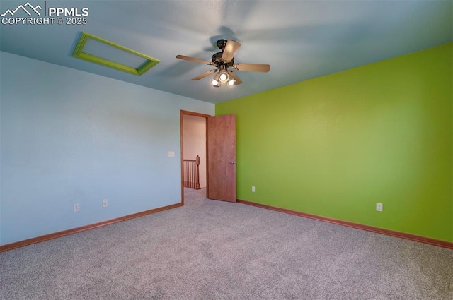 empty room featuring light colored carpet