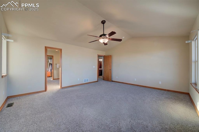 unfurnished bedroom featuring ceiling fan, lofted ceiling, and carpet floors