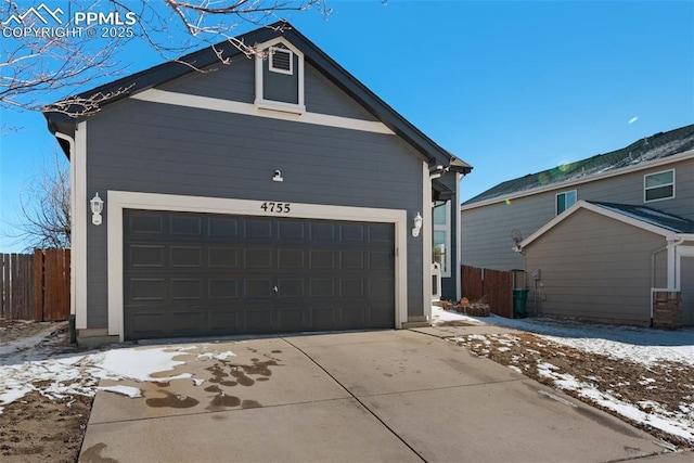 view of snow covered garage