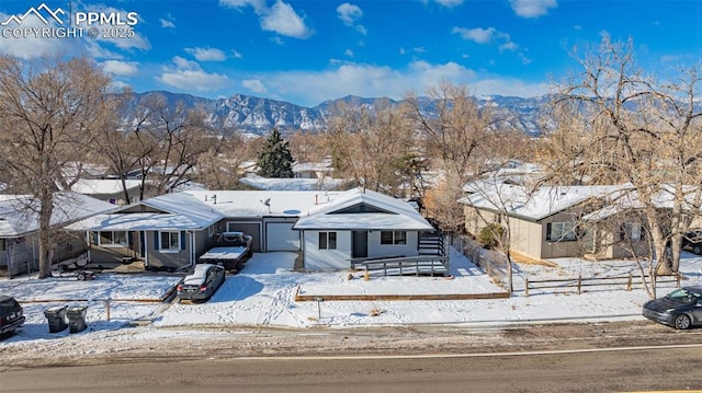 view of front of home with a mountain view