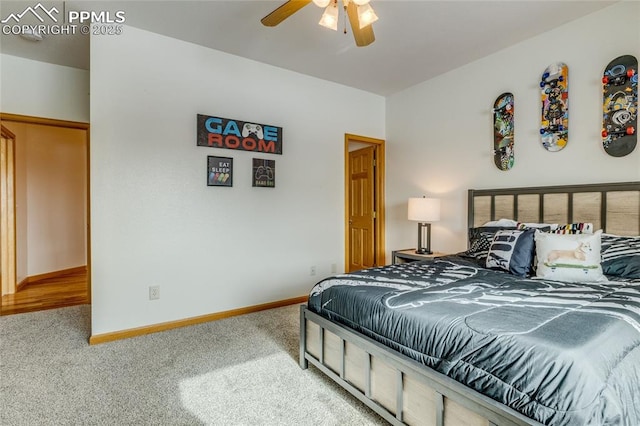 carpeted bedroom with ceiling fan