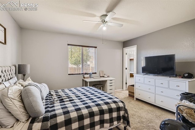 bedroom with light carpet and ceiling fan