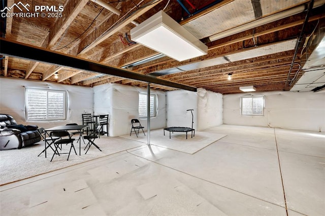 basement featuring plenty of natural light