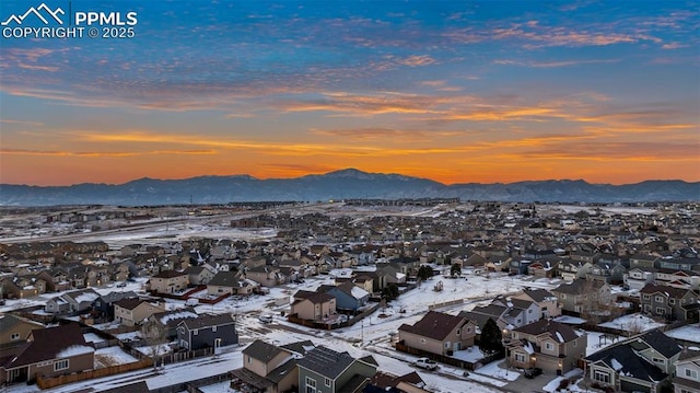 aerial view at dusk with a mountain view