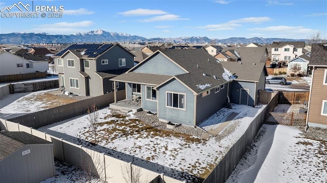 view of front of property with a mountain view