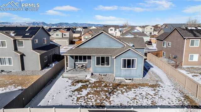 view of front of home with a mountain view