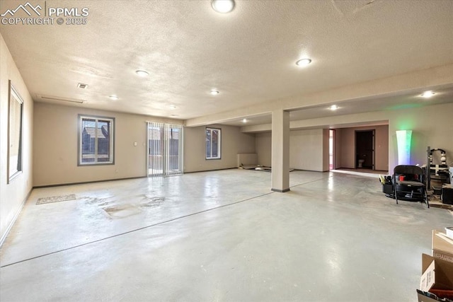 basement with a textured ceiling