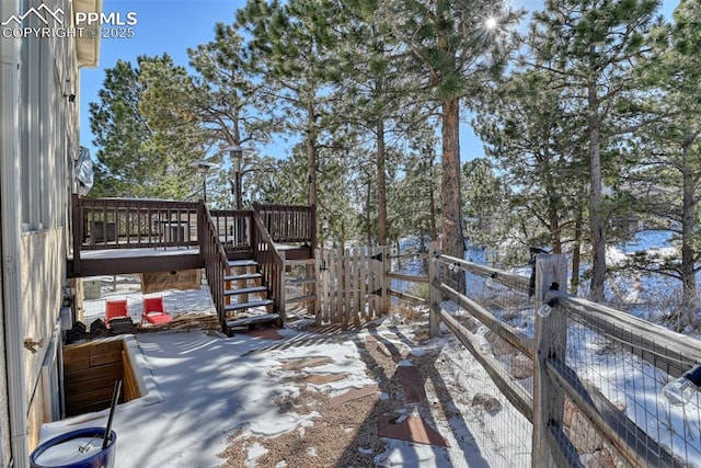 view of snow covered deck