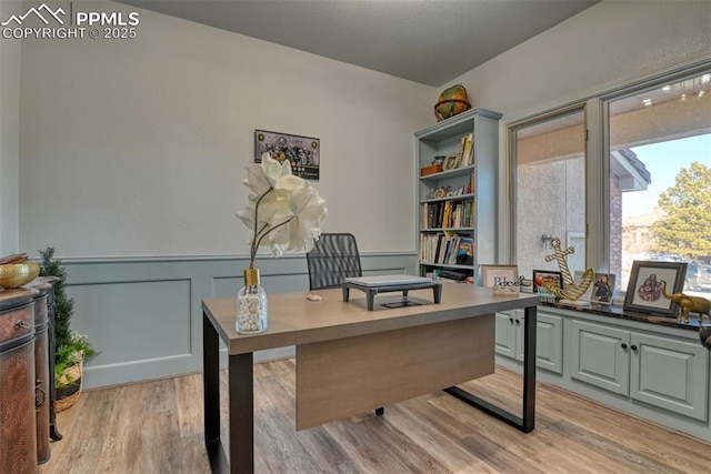 office space with light hardwood / wood-style floors