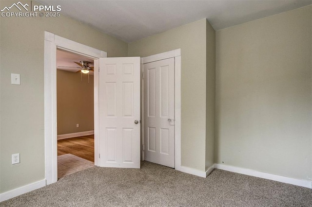 unfurnished bedroom with carpet flooring