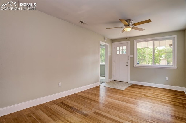 entrance foyer featuring light hardwood / wood-style floors and ceiling fan