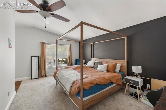 bedroom featuring ceiling fan, light carpet, and lofted ceiling