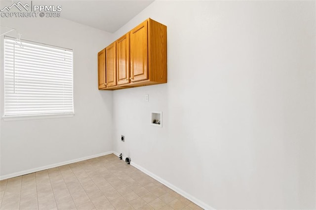 washroom with electric dryer hookup, cabinets, hookup for a gas dryer, and washer hookup