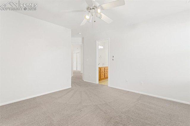 empty room featuring light carpet and ceiling fan