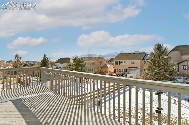 view of snow covered deck