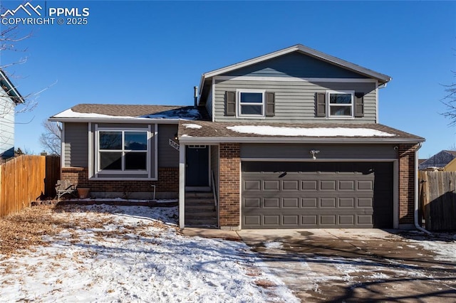 view of front of property with a garage