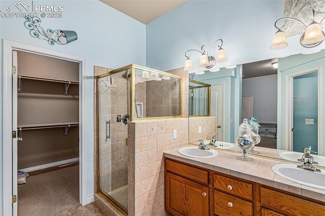 bathroom with vanity and walk in shower