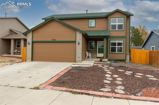 view of front of home with a garage