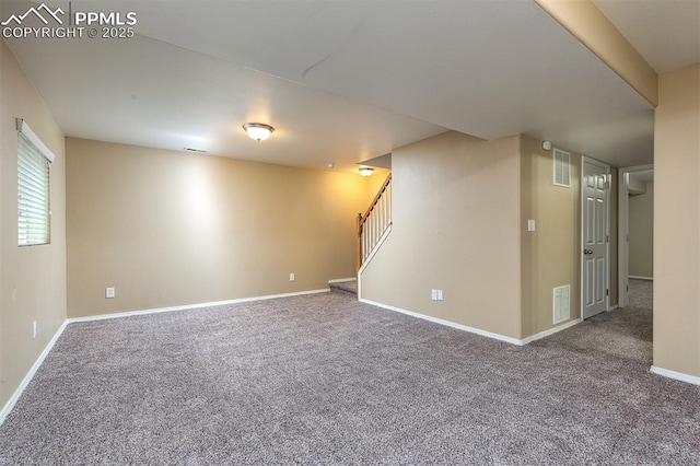 empty room featuring carpet floors