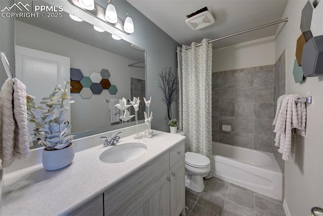 full bathroom featuring tile patterned floors, shower / bath combo with shower curtain, vanity, and toilet