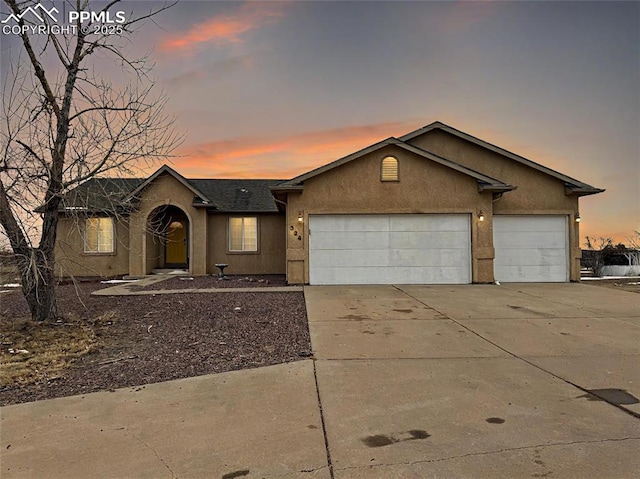 ranch-style house with a garage