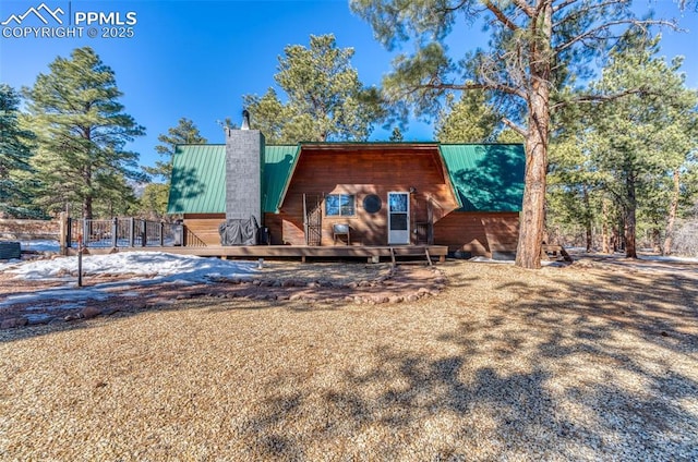 view of front of house with a wooden deck