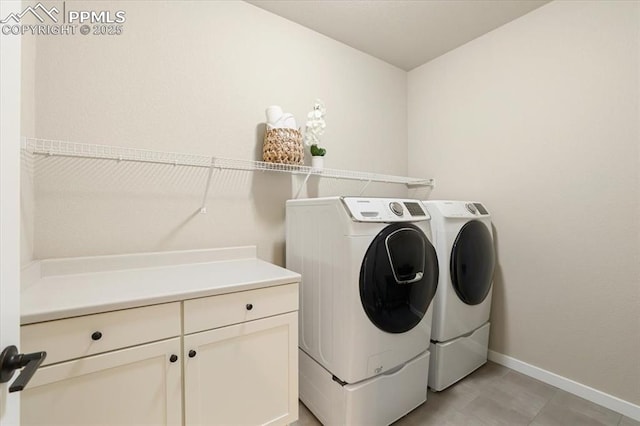 clothes washing area with independent washer and dryer