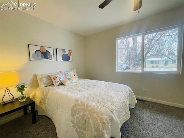 carpeted bedroom featuring ceiling fan