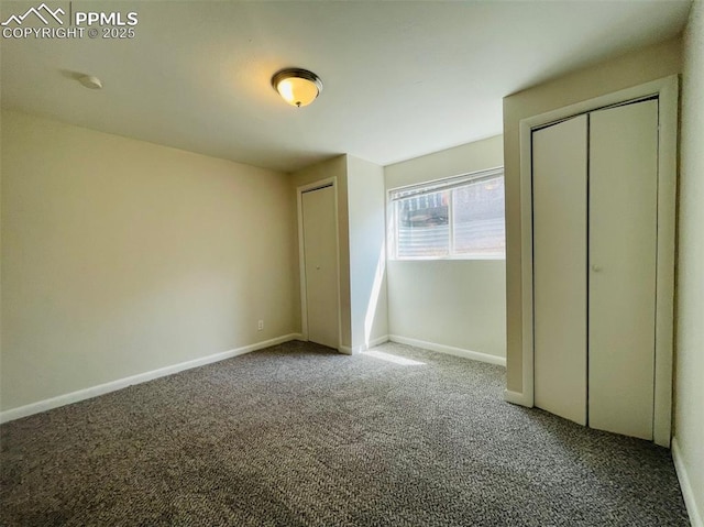 unfurnished bedroom featuring carpet