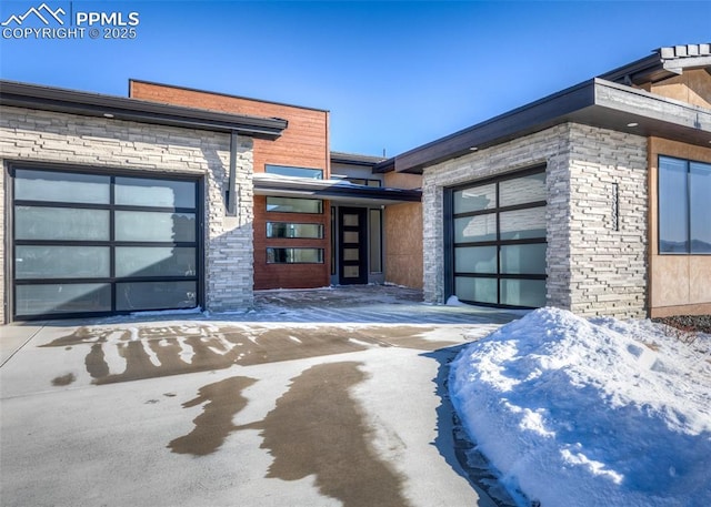 view of snow covered property entrance