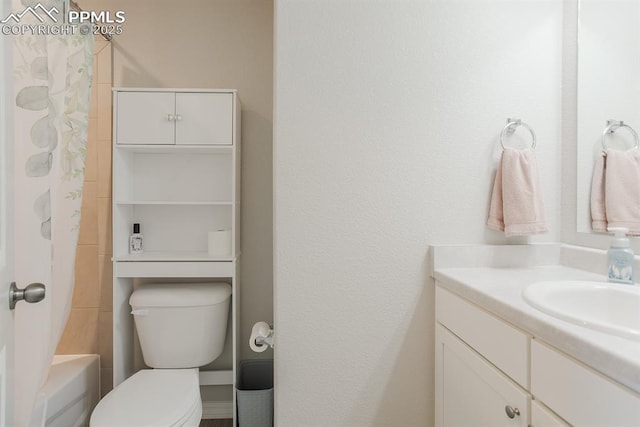 full bathroom featuring vanity, shower / tub combo, and toilet