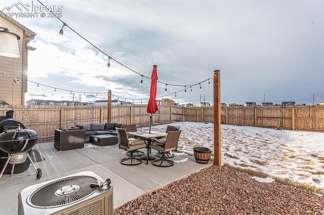 view of patio / terrace with central AC unit, an outdoor living space, and area for grilling