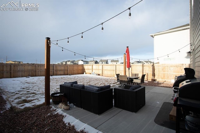 view of snow covered patio