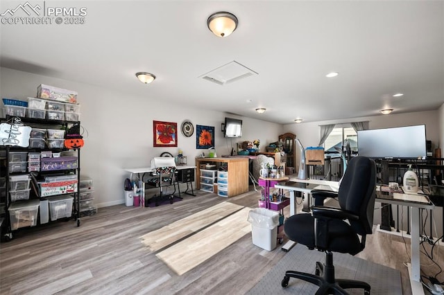 office area with hardwood / wood-style floors